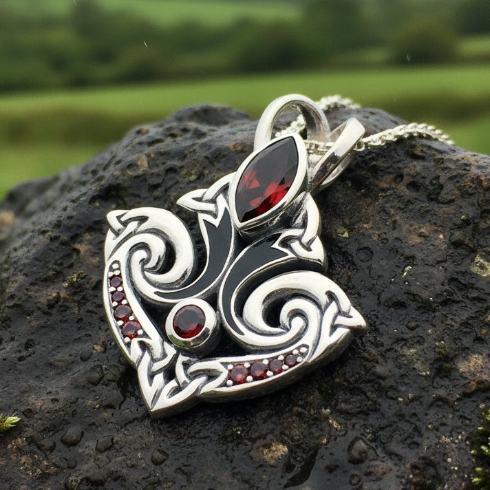 Eternal Flame Trinity Knot Garnet Necklace in Sterling Silver