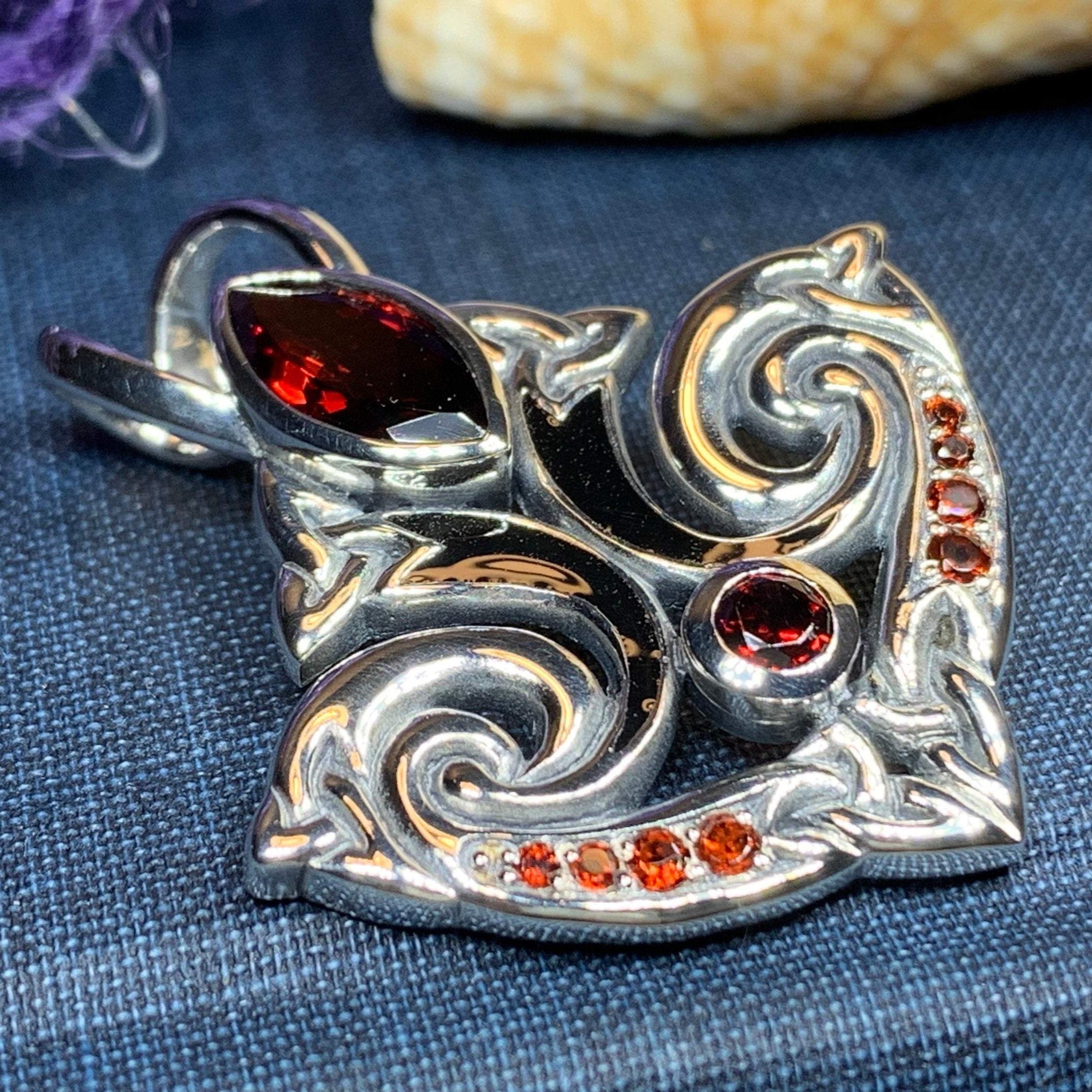 Eternal Flame Trinity Knot Garnet Necklace in Sterling Silver