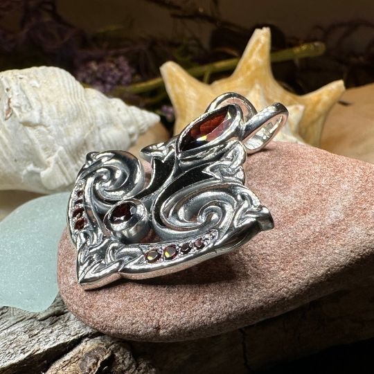 Eternal Flame Trinity Knot Garnet Necklace in Sterling Silver