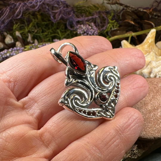 Eternal Flame Trinity Knot Garnet Necklace in Sterling Silver